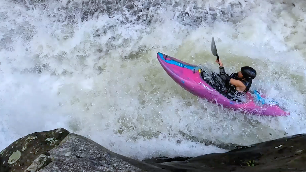 Ava Christensen taking part in the NRS kayak session magazine reel world video contest