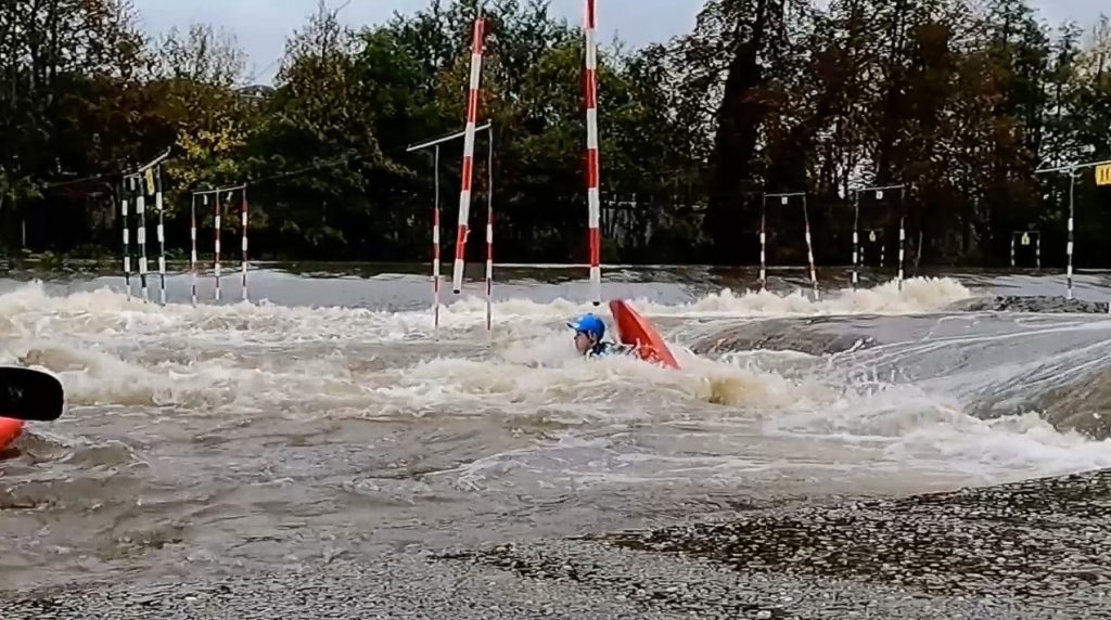"The Vortex is a hole trick where you plug your bow like you're starting a cartwheel but then you roll underneath your kayak like a backdeck roll and roll back up while you're being pushed out of the feature."