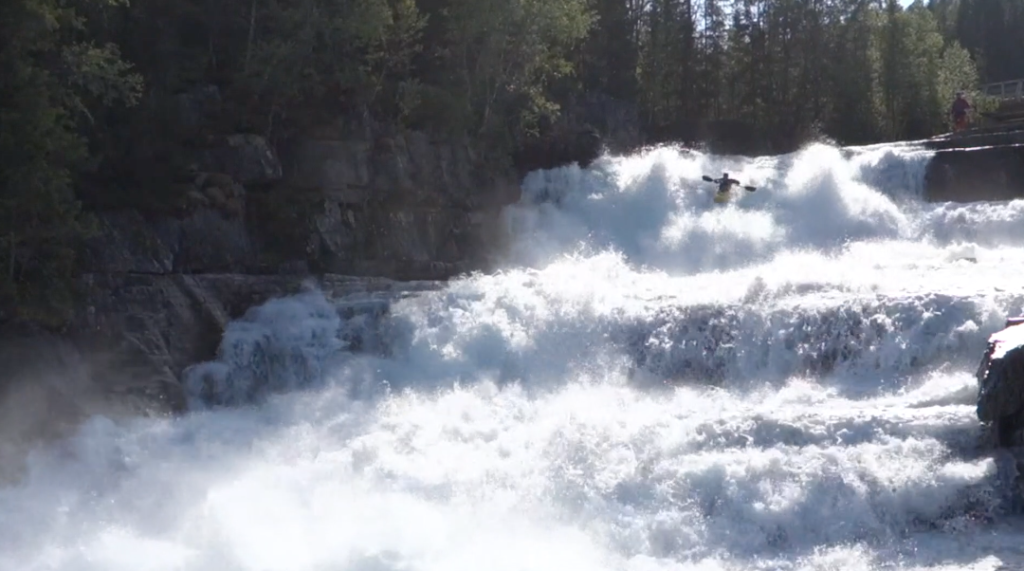 Norway based British paddler Nic Pearce running a monster slide in Norway
