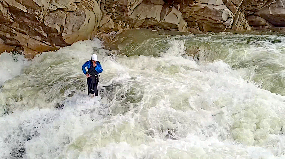 Ukranian paddler Ukraine Pavlo Mihiysky missing his roll and forced to swim on the Prut river (Ukraine), half way through Probiy waterfall, and ends up standing in the middle of the river
