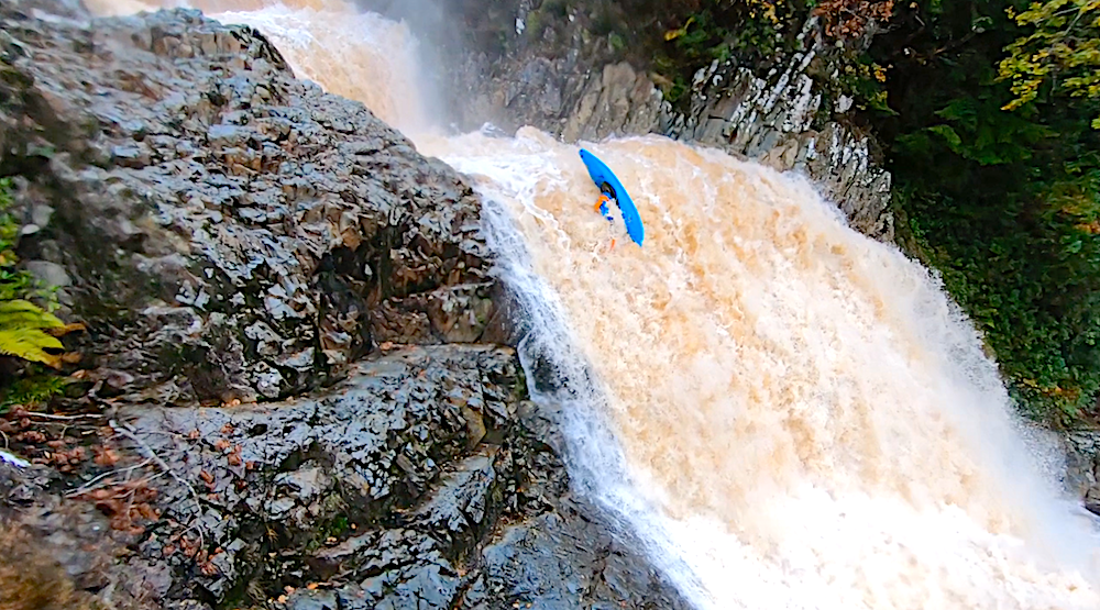 Matt Ryan running upside down the second part of the Rhaeadr Mawddach waterfall in Wales