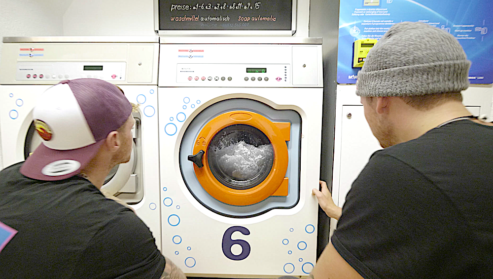 pro paddlers Bren Orton and adrian Mattern fooling around in a laundry for the filming of their latest short film entry of the kayak session short film awards ©kayaksession.com