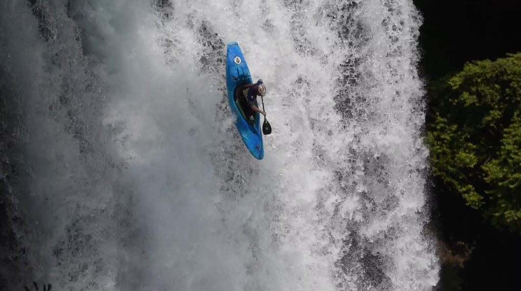 US kayaker Driscoll Larrow running a waterfall in his kayak in Chile.