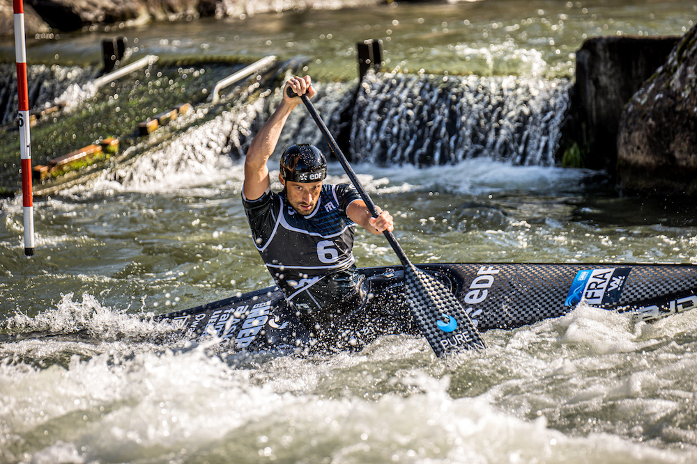 Denis Gargaud Olympic Champion C1 paddler racing in Pau france at the champions race