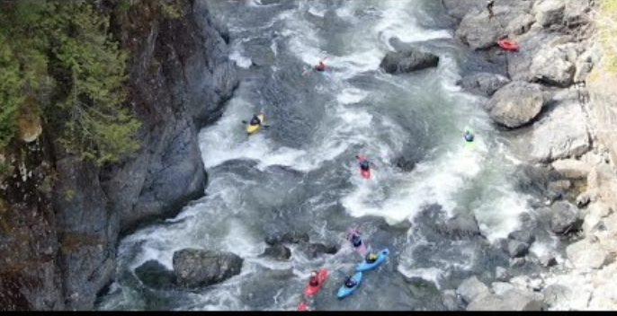 "Heber Fever is a paddling festival that happens on Easter weekend on Vancouver Island. The town of Gold River is considered the "promised land" by some for whitewater kayaking. Both the Gold River and the Heber River flow right through the town, and within half an hour of driving there are 10 quality runs from class II to V, from big water to creeking. Easter weekend draws boaters of all types for some paddling fun, a baseball game, camping, and an easter egg hunt. 2022 saw our lowest flows yet, but even when the flows are low, you can still have a great time. See you next year!" By Heather Quinn.
